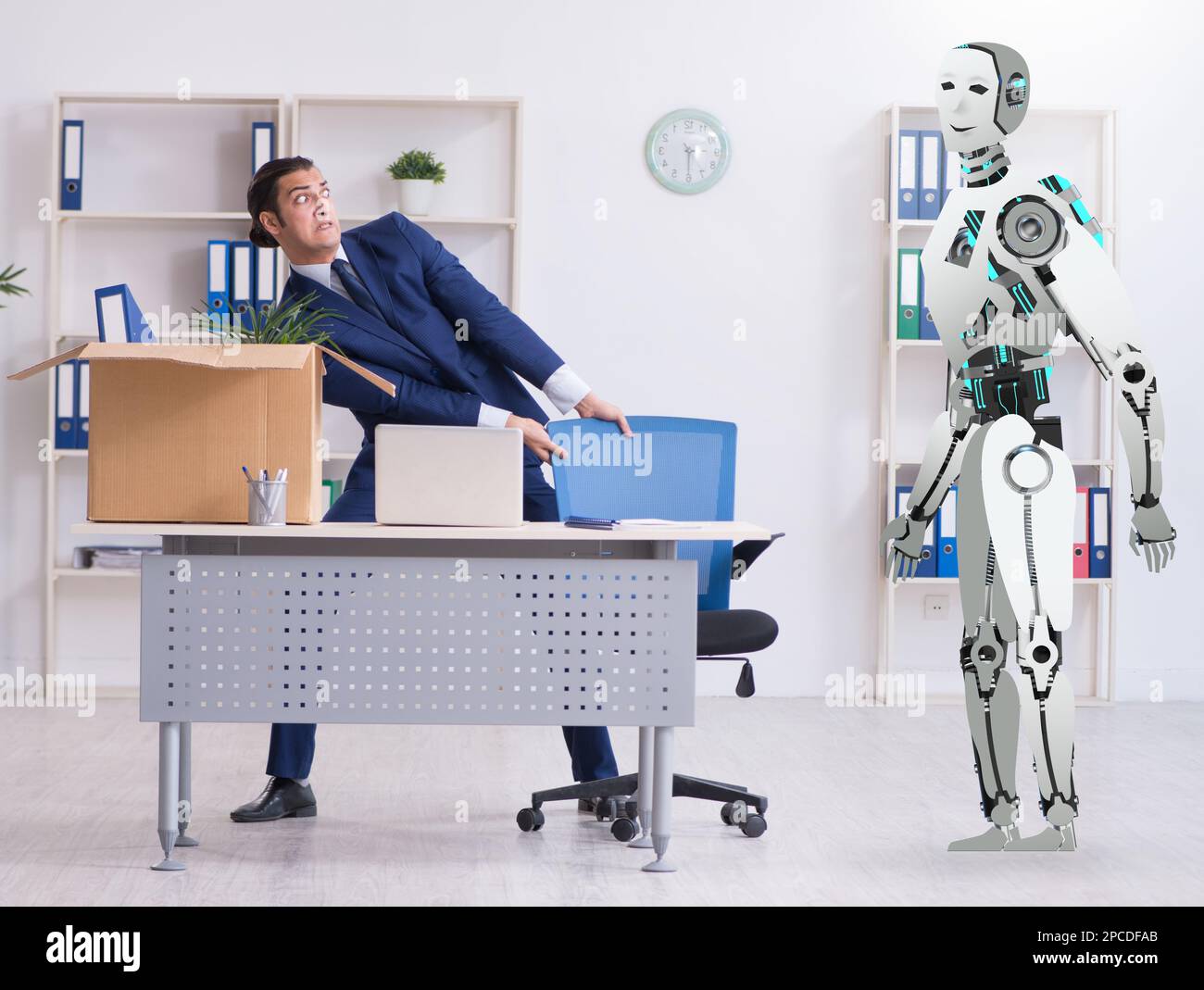 The concept of robots replacing humans in offices Stock Photo Alamy