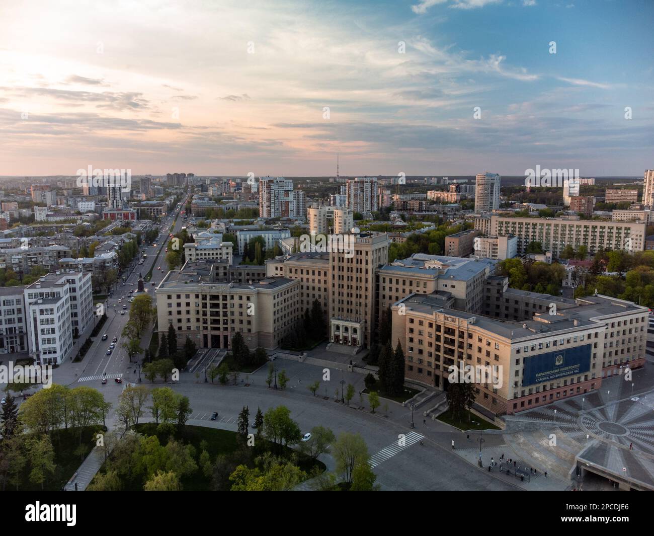 Sunset city aerial view on Karazin National University northern building in epic light in Kharkiv, Ukraine. Translation (Karazin University, a timeles Stock Photo