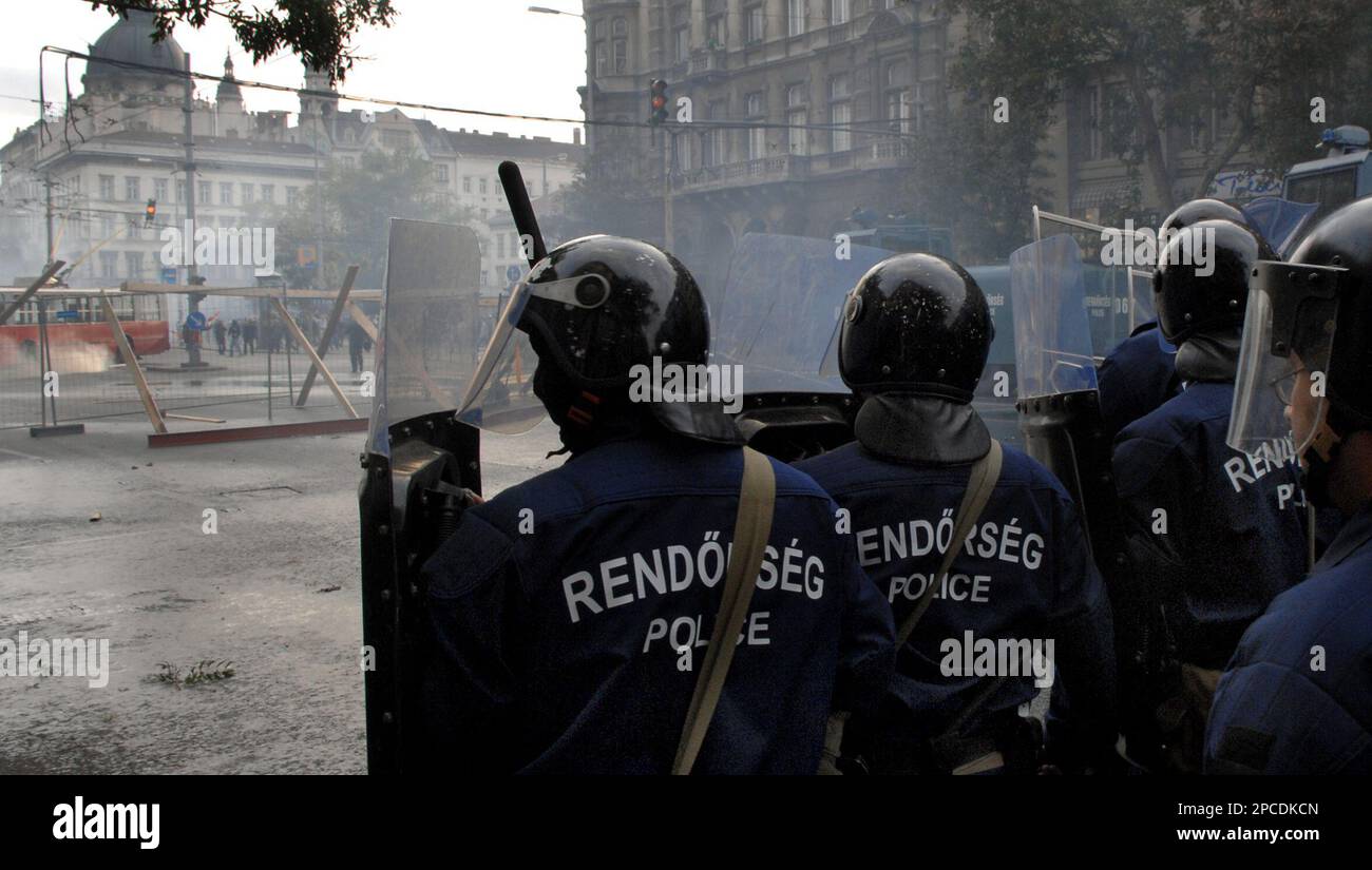Riot police officers secure an area in downtown Budapest, Hungary ...