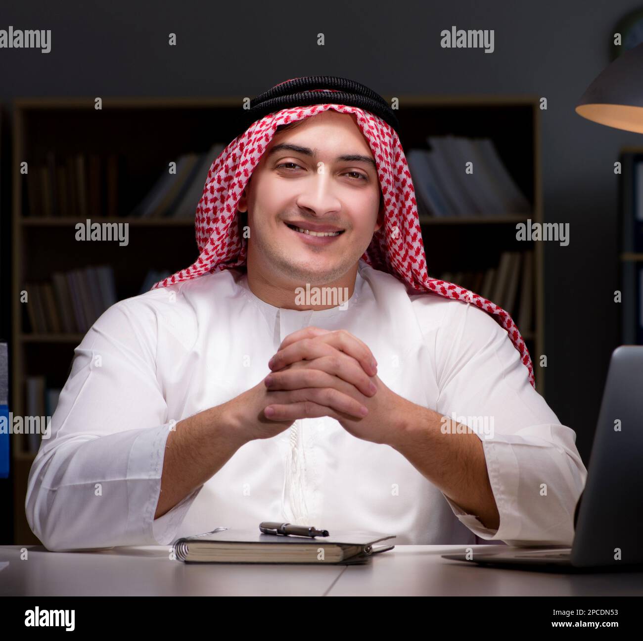 The arab businessman working late in office Stock Photo - Alamy