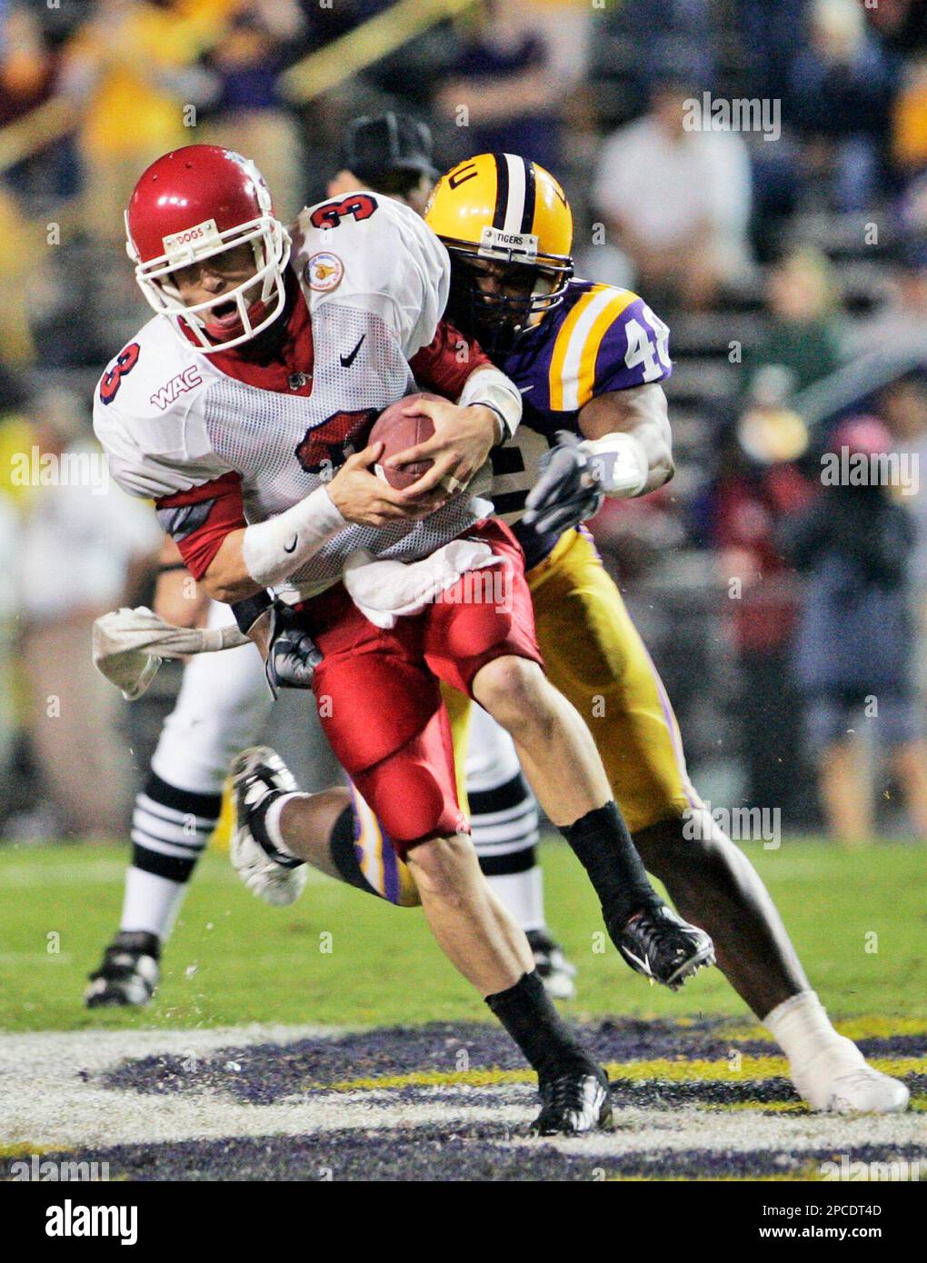 Fresno State quarterback Sean Norton (3) is sacked by Louisiana 