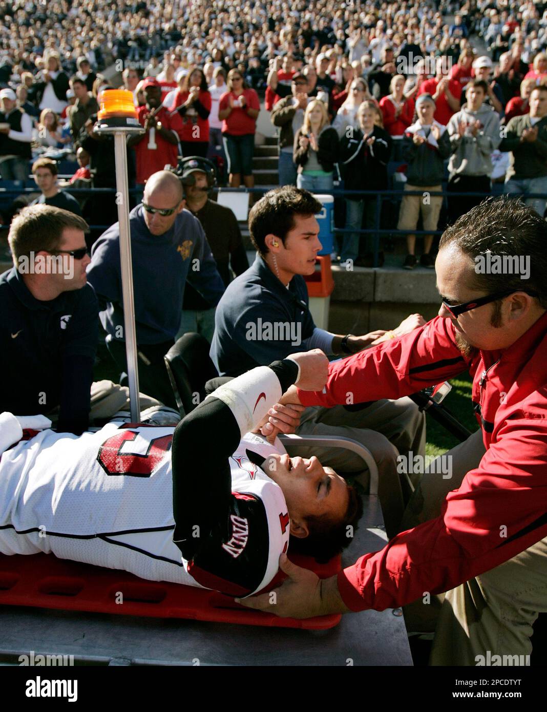 UNLV quarterback Shane Steichen (15) acknowledges the crowd's applause as  he is taken off the field with an dislocated and fractured right ankle  during the third quarter of a college football game