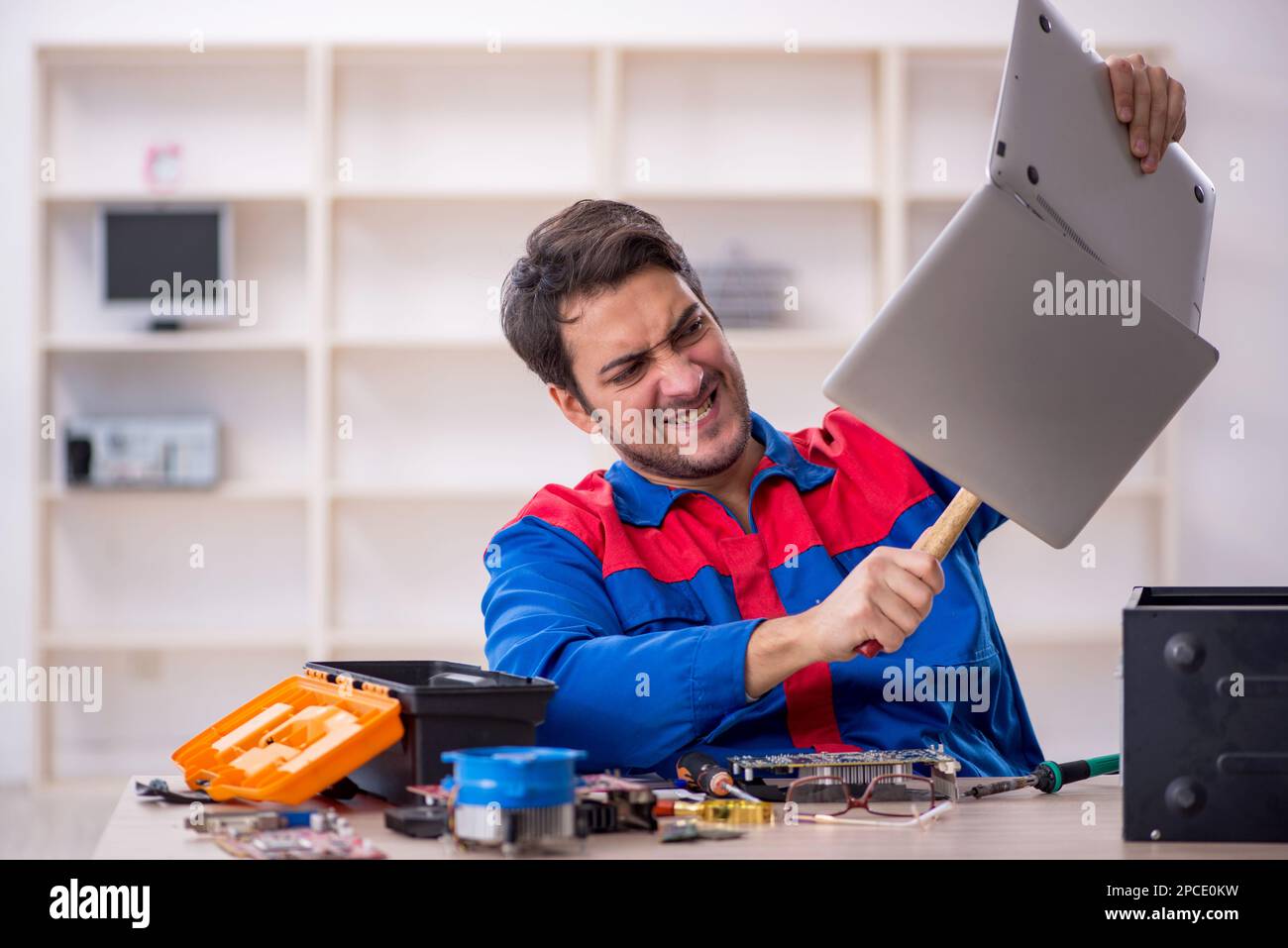 Man destroying computer hi-res stock photography and images - Alamy