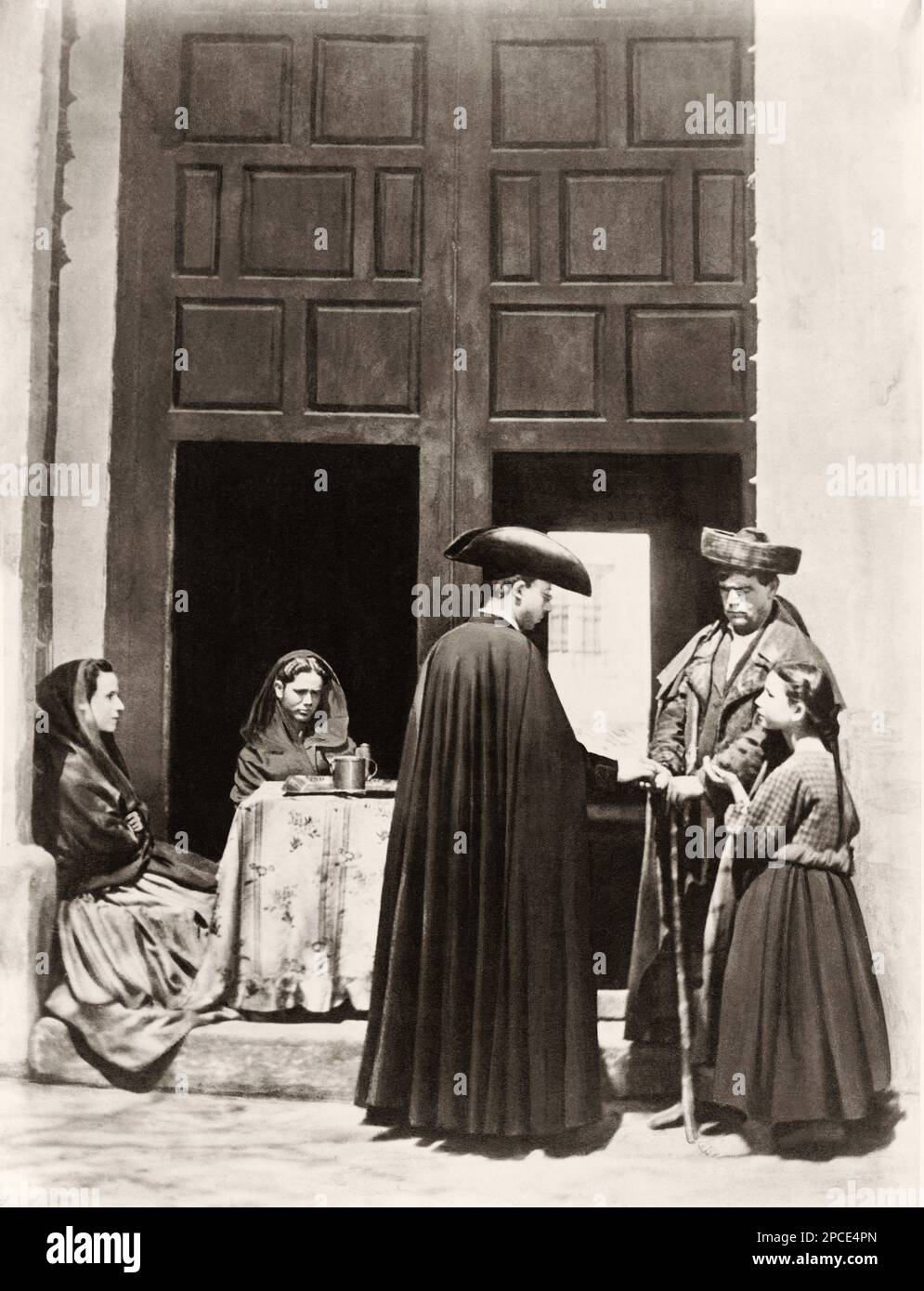 1880 ca,  CORDOBA , ANDALUSIA ,  SPAIN  : On a Church door -  folkloristic dress  . Photo by J. Laurent , Madrid -  SPAGNA  - FOTO STORICHE - HISTORY PHOTOS - FOLKLORE -    - GEOGRAFIA - GEOGRAPHY -  OTTOCENTO - XIX CENTURY - 800's - '800 - donna - donne in costume popolare - folkloristico - popolane - beggars - sulla porta di una CHIESA - povero - poveri - poors - elemosina - questua - prete - priest - RELIGIONE - RELIGION - CORDOVA - Andalusia----  Archivio GBB Stock Photo