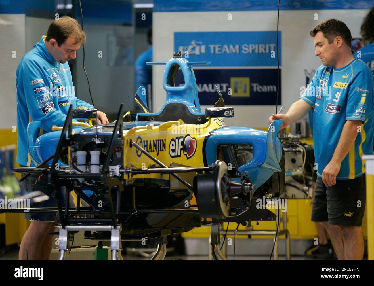 Mechanics of the Renault F1 team work on a car at the Interlagos racetrack in Sao Paulo Brazil on Wednesday Oct. 18 2006. Brazil s Grand Prix will take place on Sunday Oct