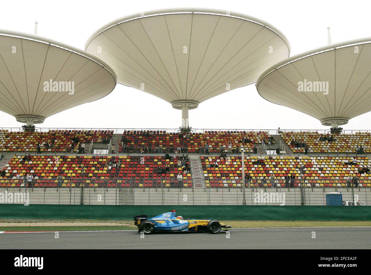 FILE ** Spanish driver Fernando Alonso of Renault F1 team drives his car during the second free practice at Shanghai International Circuit in Shanghai, China, in this October 14, 2005, file