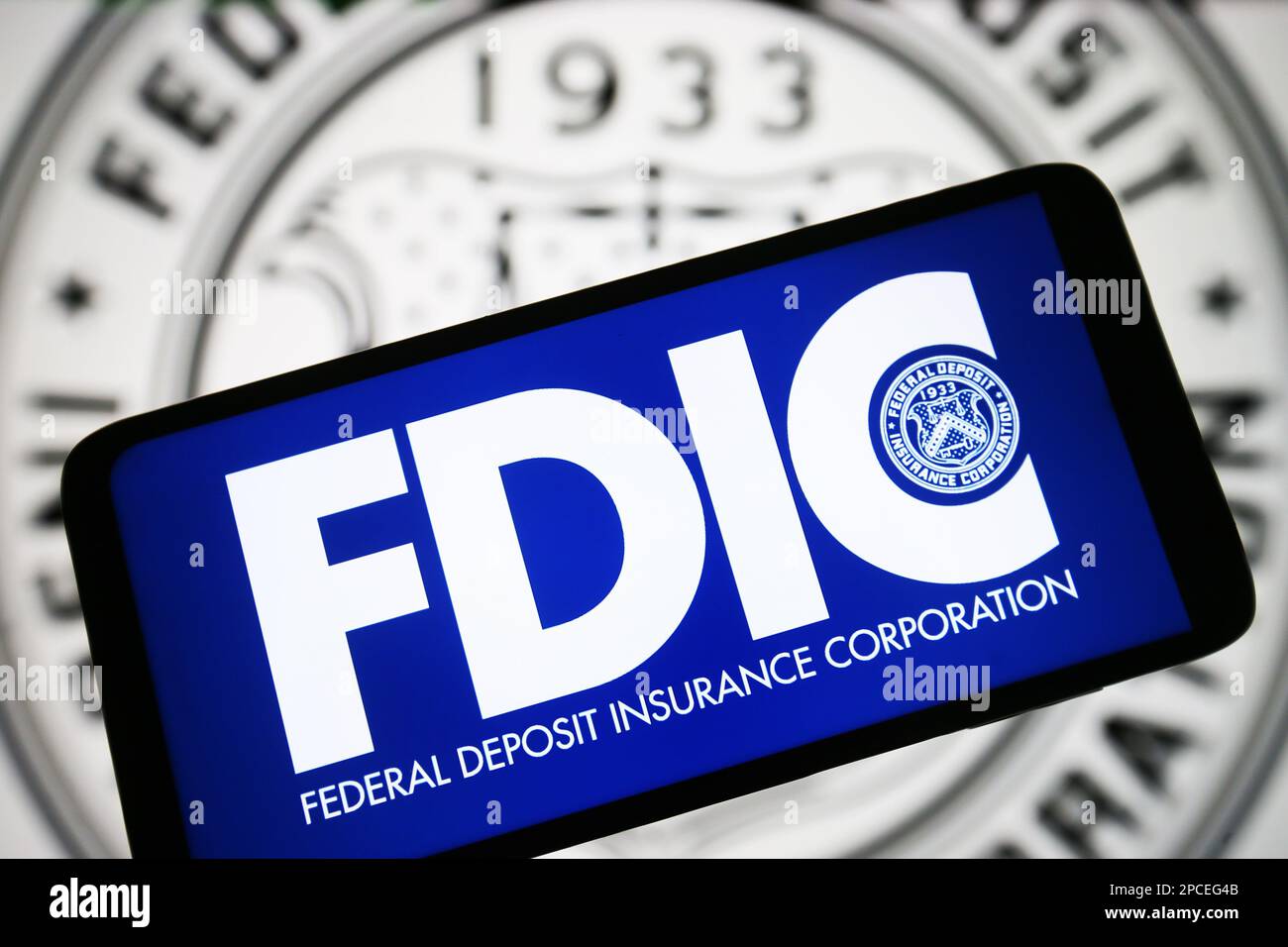 In this photo illustration, Federal Deposit Insurance Corporation (FDIC) logo is seen on a