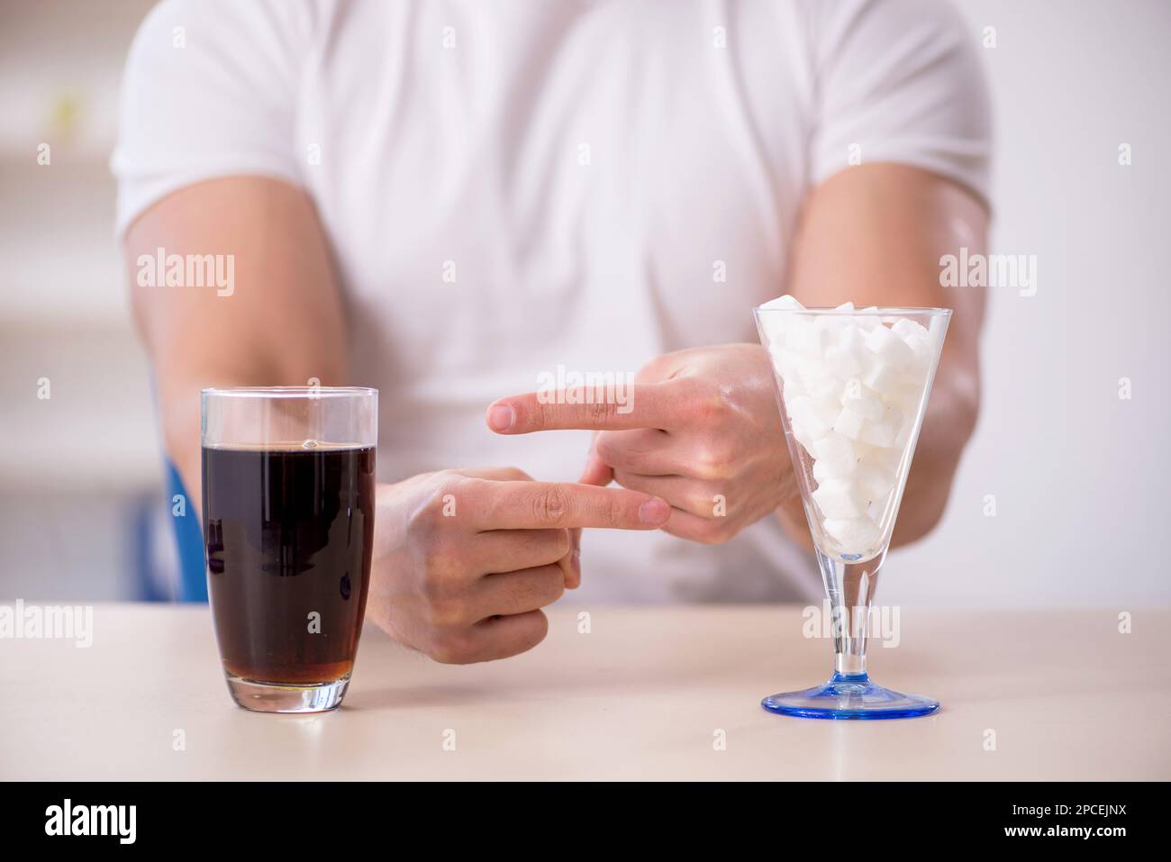 Young student testing soft drink Stock Photo Alamy