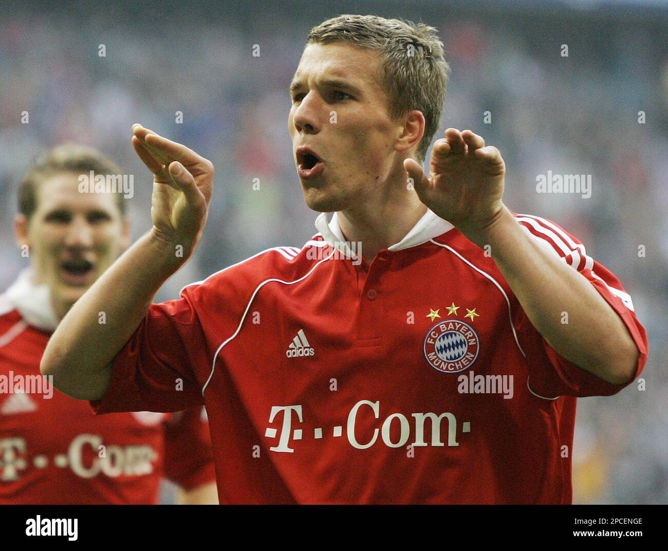 Bayern Munich's Lukas Podolski celebrates scoring during the