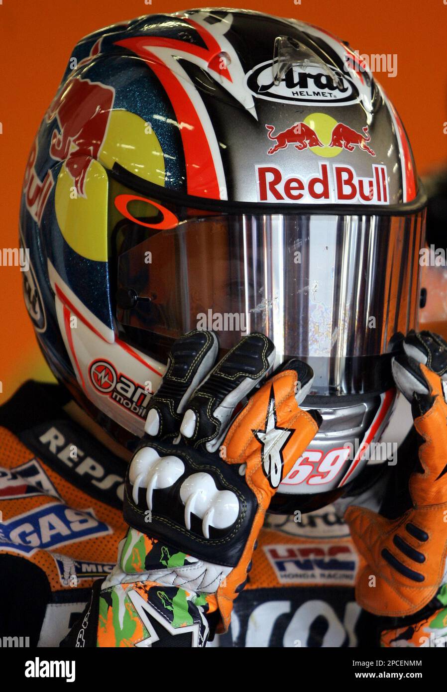 Nicky Hayden from the United States adjusts his helmet Saturday