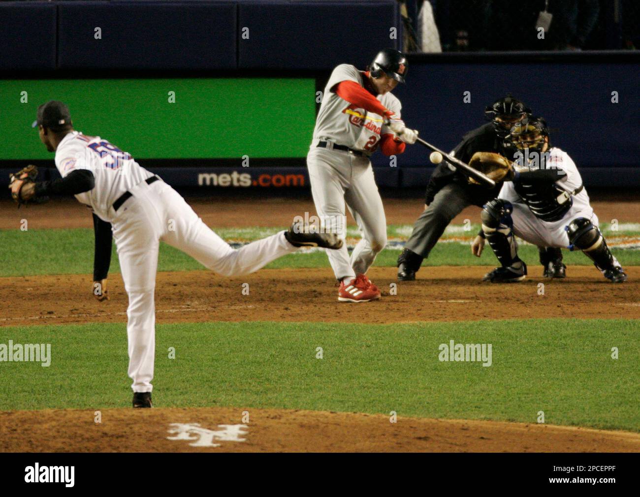 St. Louis Cardinals' Scott Spiezio triples to drive in two runs off New