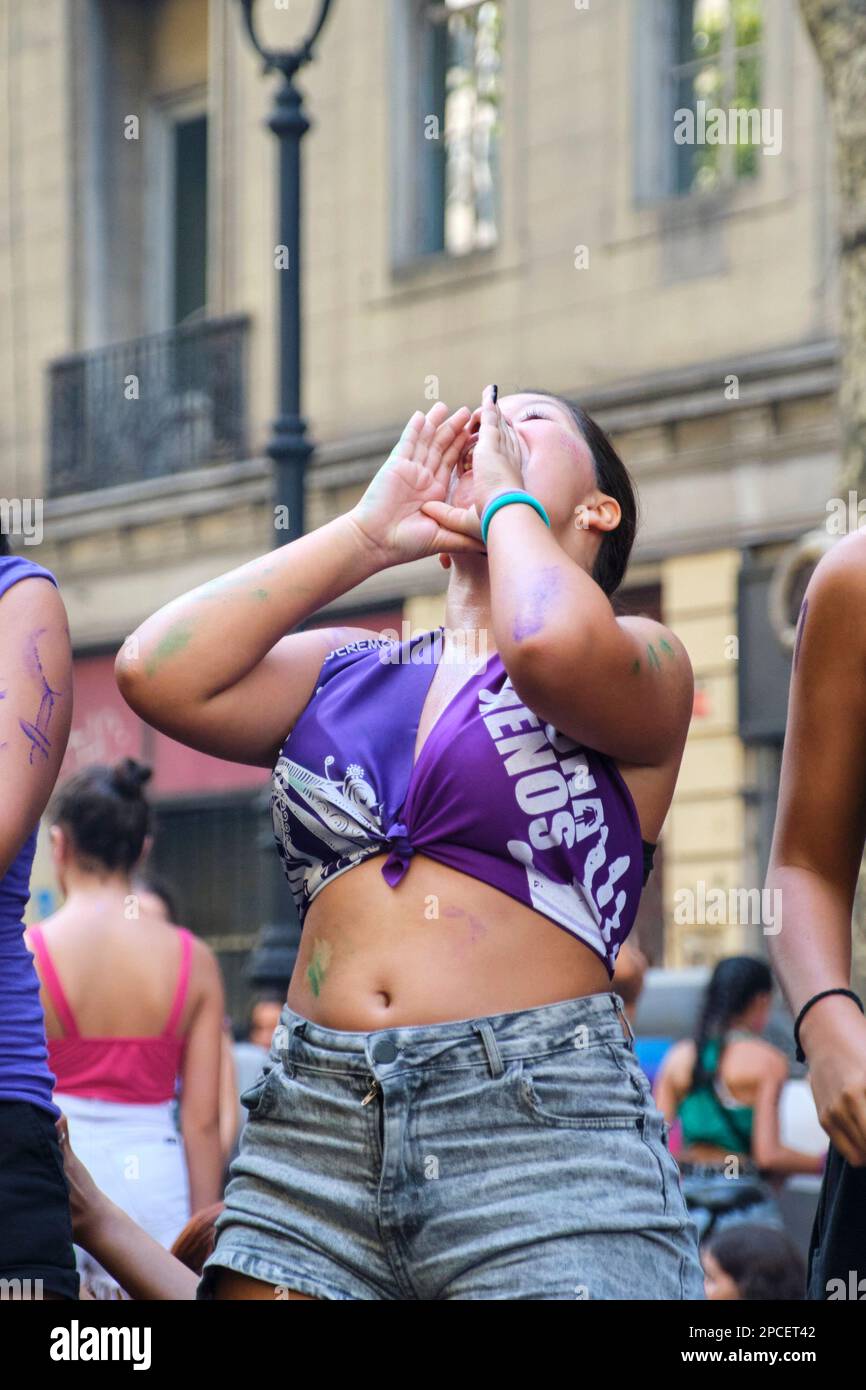 Buenos Aires, Argentina; March 8, 2023: International feminist strike; young woman chanting slogans, shouting, claiming the equality for women Stock Photo