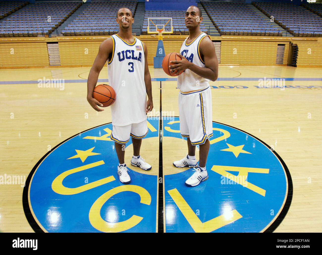 UCLA's Josh Shipp (3) and Aaron Afflalo pose at center court at UCLA's