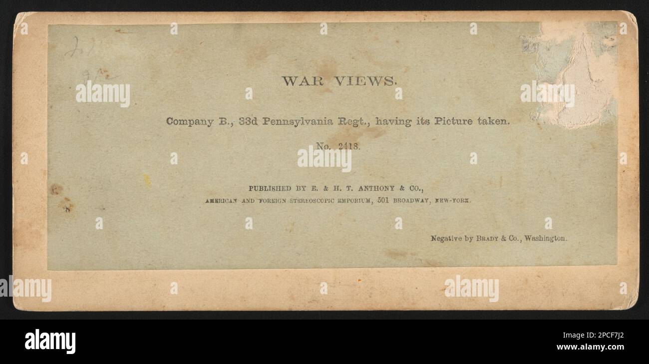 Company B, 33d Pennsylvania Regiment, having its picture taken / published by E. & H.T. Anthony & Co., American and Foreign Stereoscopic Emporium, 501 Broadway, New York.. Liljenquist Family Collection of Civil War Photographs , pp/liljpaper. United States, Army, Pennsylvania Infantry Regiment, 33rd (1861-1864), People, Soldiers, Union, 1860-1870, Military uniforms, Union, 1860-1870, United States, History, Civil War, 1861-1865, Military personnel, Union. Stock Photo