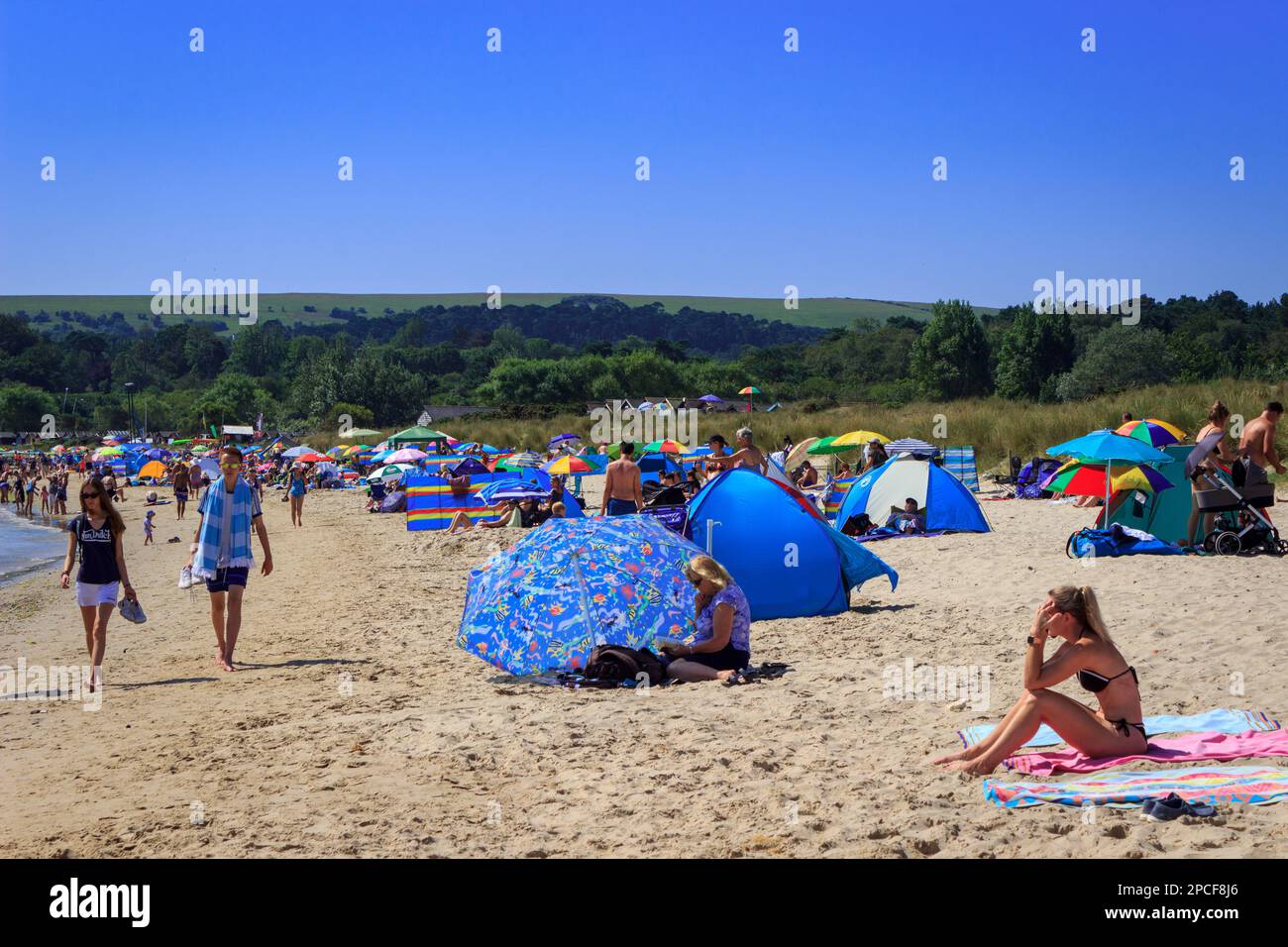 Holidaymakers, Studland beach, Dorset Stock Photo