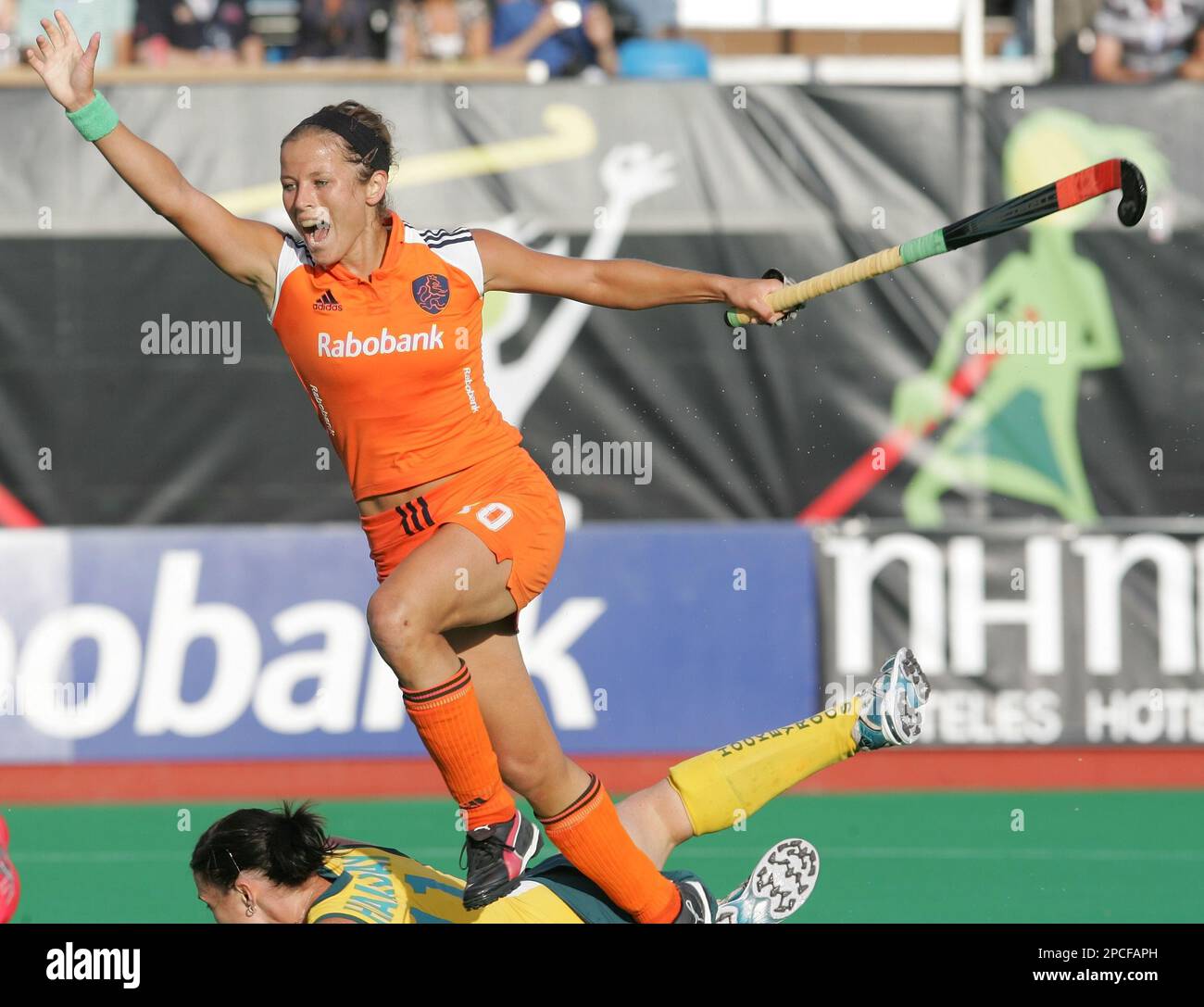 Dutch player Sylvia Karres celebrates after score against Australia during the Women's Hockey World Cup final match against Australia in Madrid, Sunday Oct. 8, 2006. Netherlands beat Australia 3-1 and won the gold medal. (AP Photo/Bernat Armangue) Stock Photo