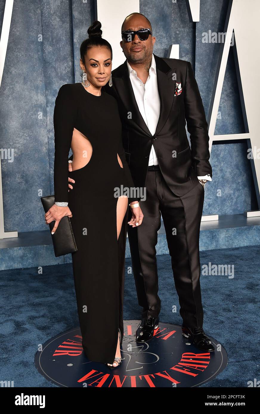 Brandi Padilla and Kenya Barris arriving at the Vanity Fair Oscar Party