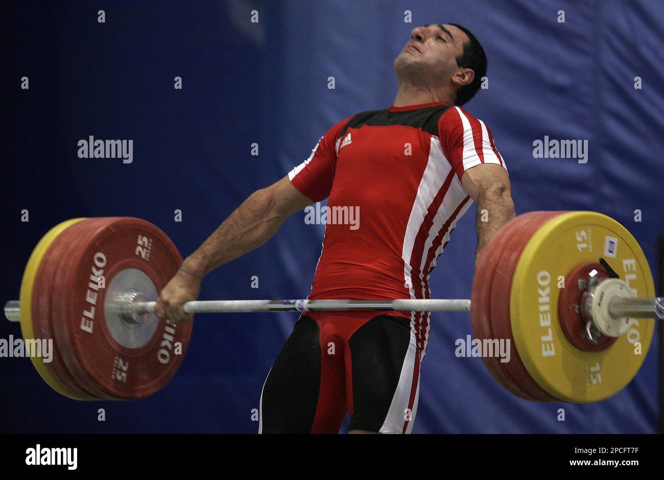 Armenia's Khachatryan Ara lifts 165 kgs (364 lbs) to win the bronze medal  in snatch modality of the men's 77 kgs (170 lbs) category at the World  Weightlifting Championships in Santo Domingo,