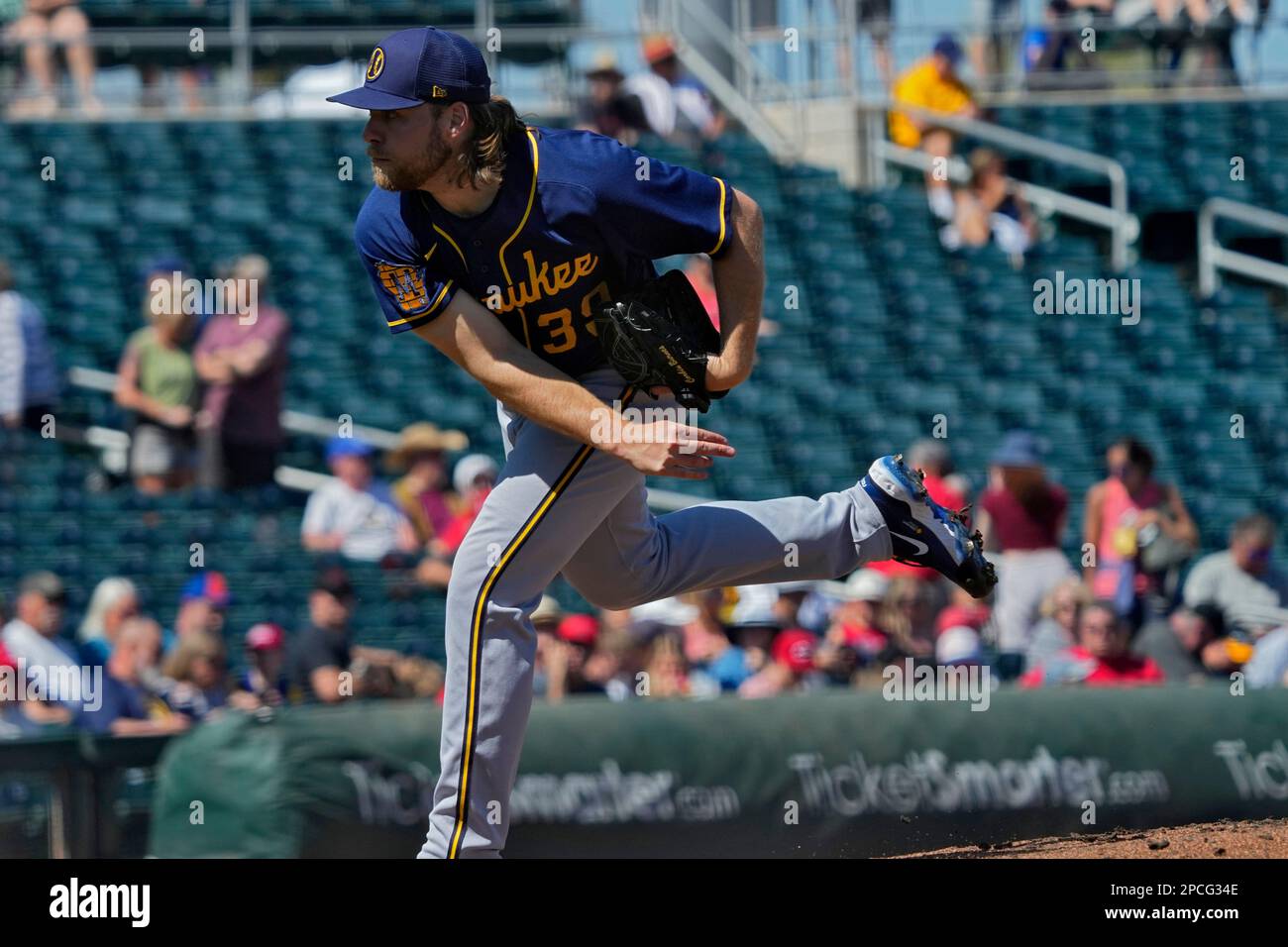 Milwaukee Brewers starting pitcher Corbin Burnes throws against the  Cincinnati Reds during the first inning of a spring training baseball game,  Monday, March 13, 2023, in Goodyear, Ariz. (AP Photo/Matt York Stock