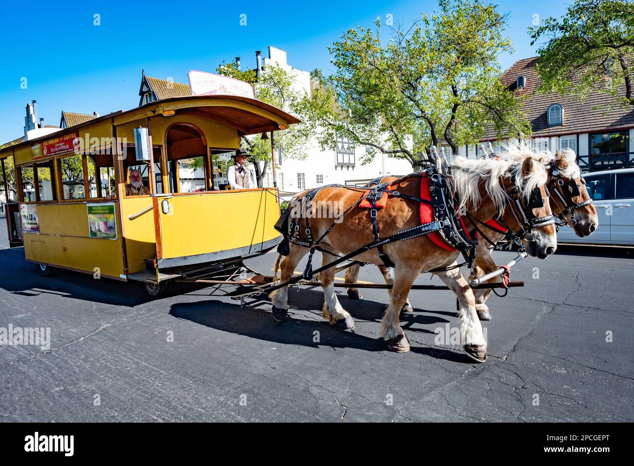 Solvang, USA April 22, 2019guide explains tourists the history of Solvang in a horse drawn