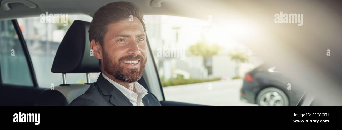 Smiling man steering wheel hi-res stock photography and images - Alamy