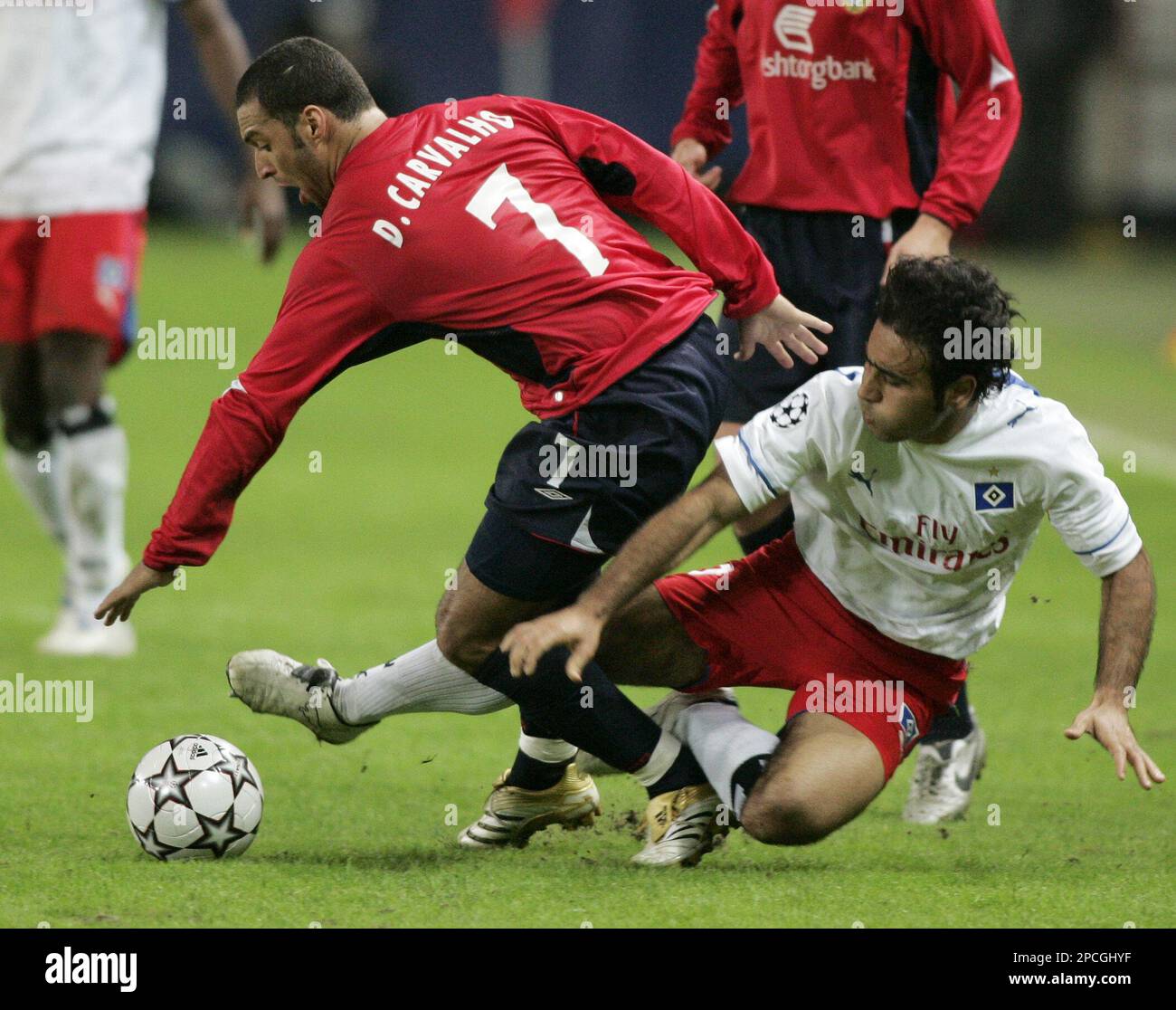 CSKA Moscow's Daniel Carvalho, left, struggles for the ball with CSKA Moscow's Daniel Carvalho, left, struggles for the ball with