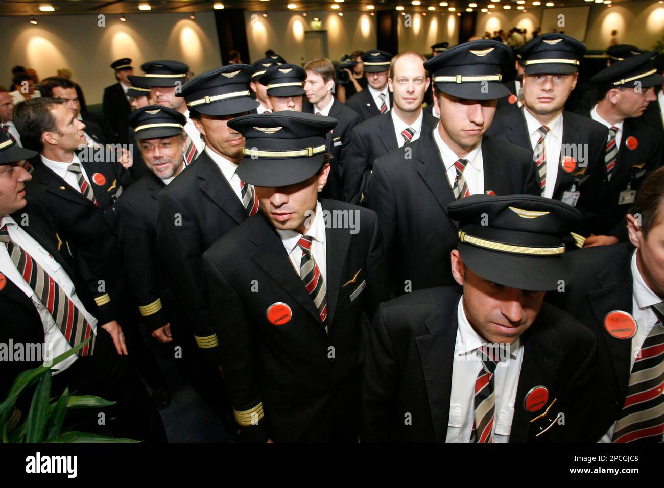 Swiss International Air Lines pilots leave the plenary meeting of the pilot  association Swiss Pilots during a one-day strike at Zurich airport in  Kloten, Switzerland, Tuesday, Sept. 26, 2006. The strike so