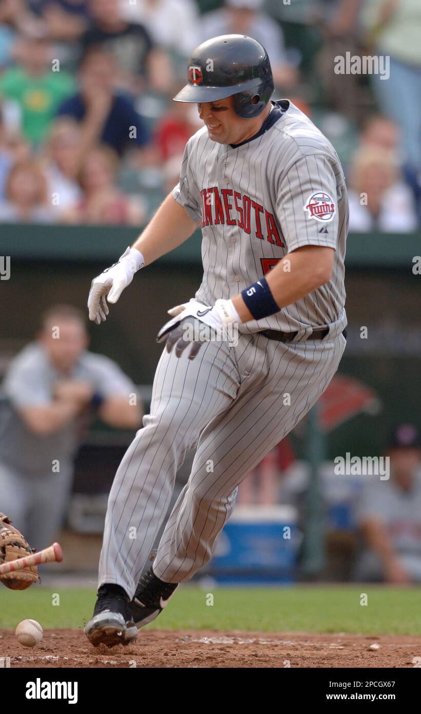 Minnesota Twins Michael Cuddyer runs to first after striking out against Baltimore Orioles in the third inning of a baseball game Saturday Sept. 23 2006 in Baltimore. Cuddyer made it to second