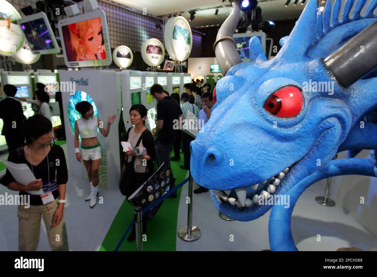 Visitors are greeted by a huge sculpture of "Blue Dragon" at Xbox 360 video game show space the Tokyo Game Show 2006 in Makuhari, east Tokyo, Friday, Sept.