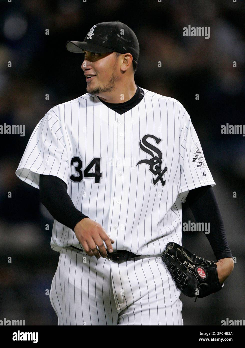 Chicago White Sox pitcher Freddy Garcia (34) smiles as he walks off the  field during the eighth inning of a baseball game in Chicago, Tuesday,  Sept. 19, 2006. (AP Photo/Brian Kersey Stock