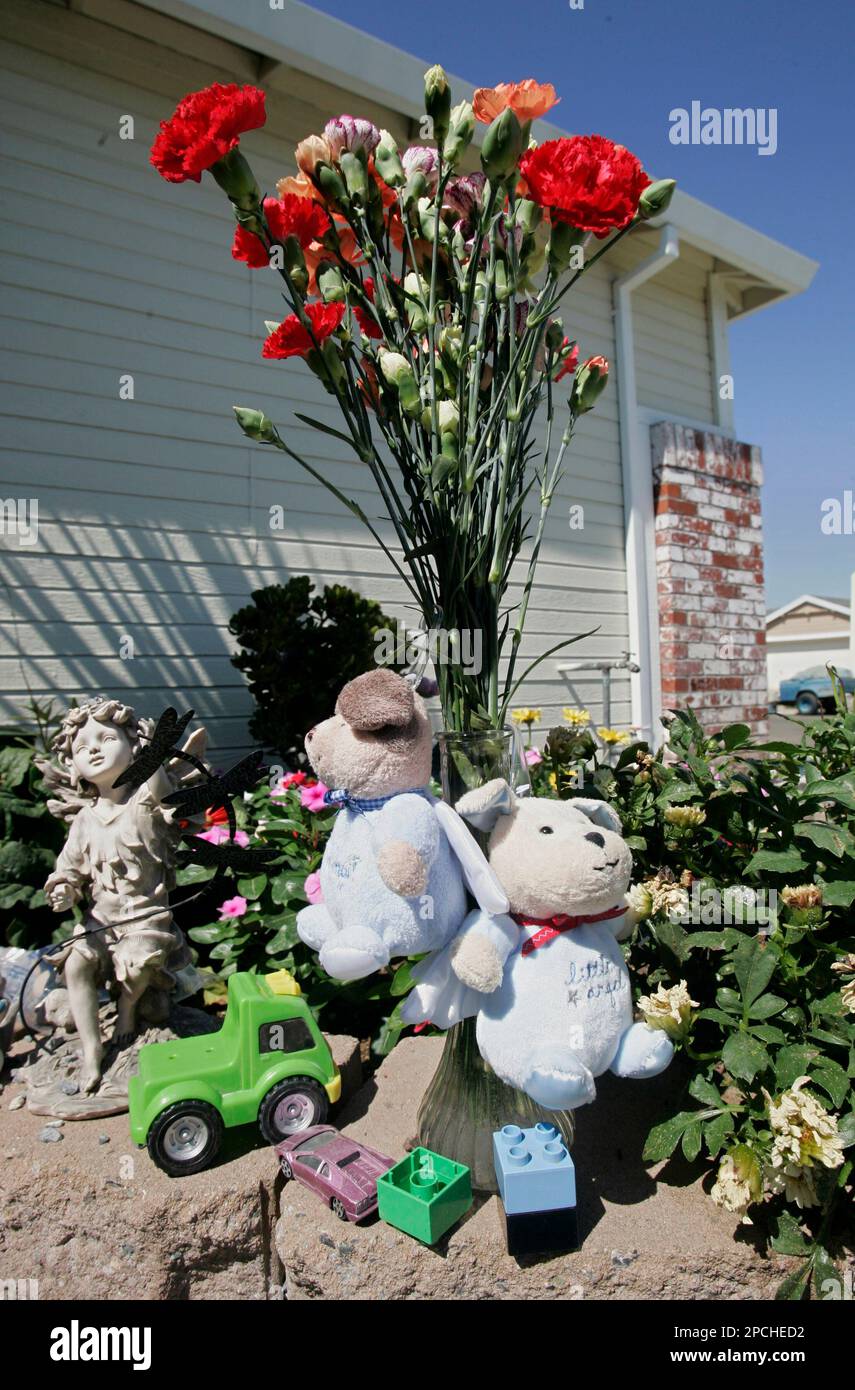 Flowers and toys are seen at the Olivehurst, Calif., home, Monday, Sept