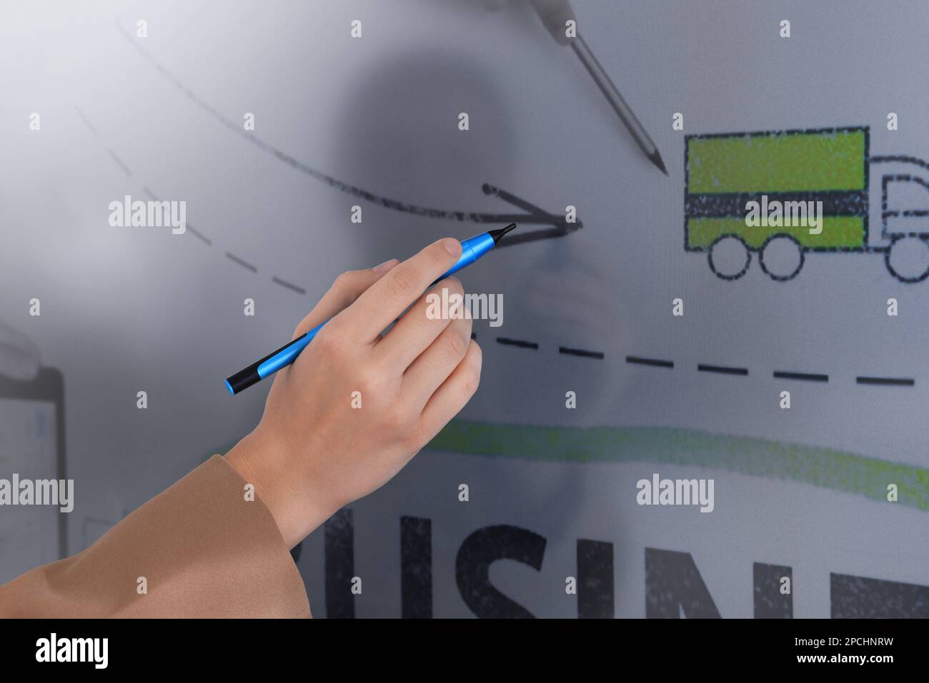 Business trainer with pen using interactive board, closeup Stock Photo
