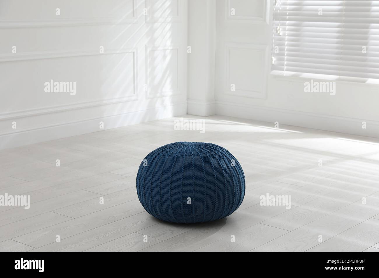 Stylish blue pouf in room. Home design Stock Photo Alamy