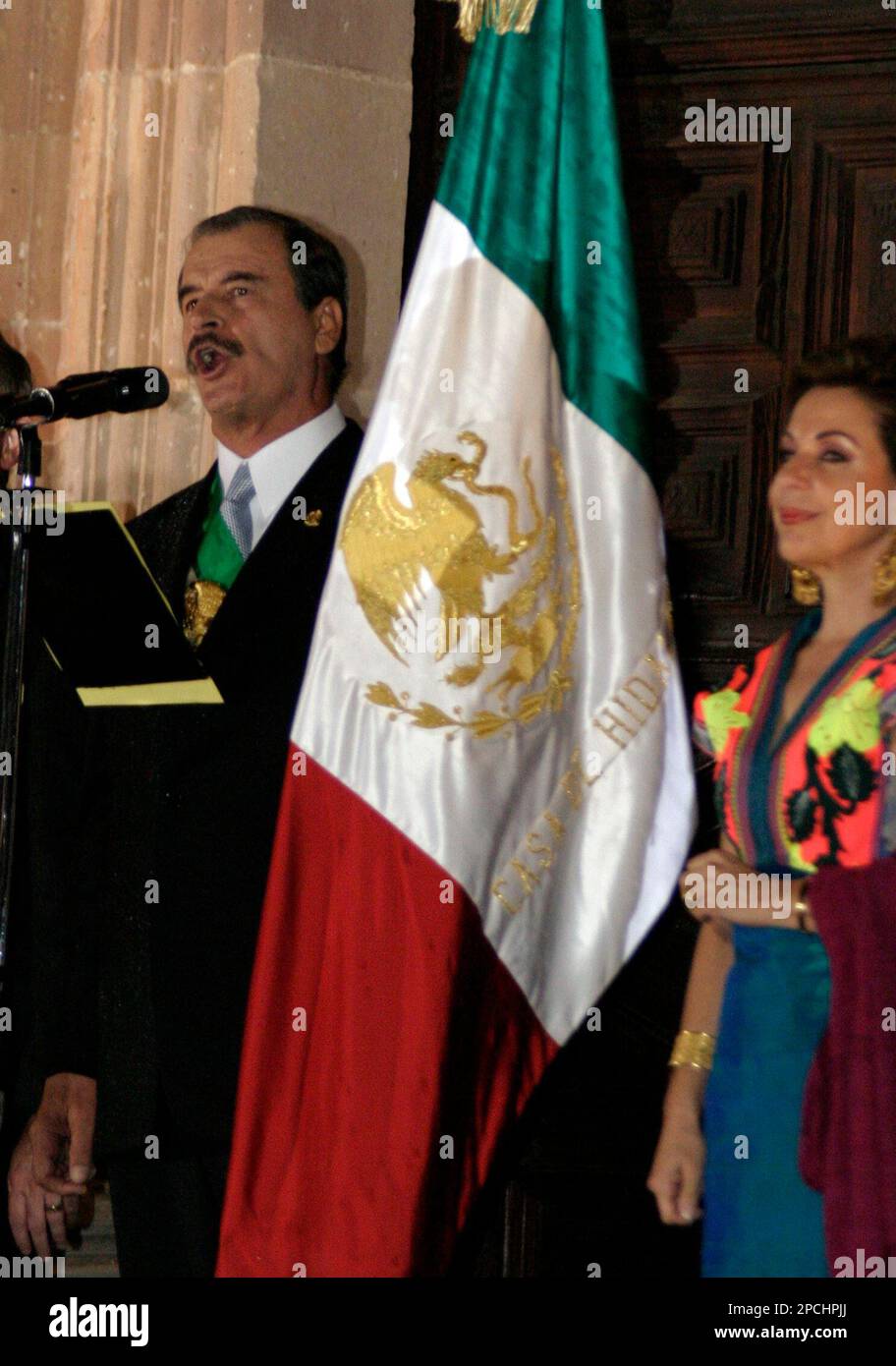 Mexican president Vicente Fox gives the traditional "grito" or shout of
