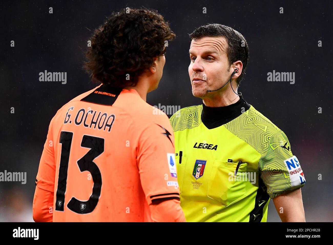 Milan, Italy. 13 March 2023. Referee Federico La Penna argues with Guillermo Ochoa of US Salernitana during the Serie A football match between AC Milan and US Salernitana. Credit: Nicolò Campo/Alamy Live News Stock Photo