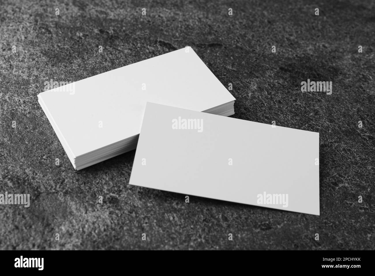 Blank business cards on grey table. Mockup for design Stock Photo Alamy