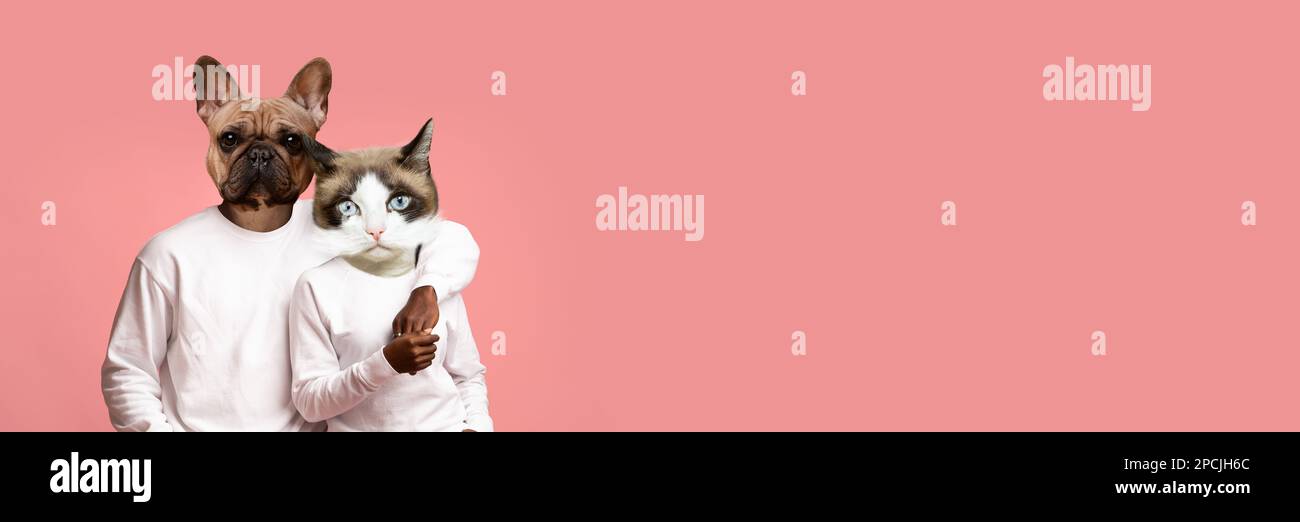 Beautiful african american lovers with heads of dog and cat Stock Photo