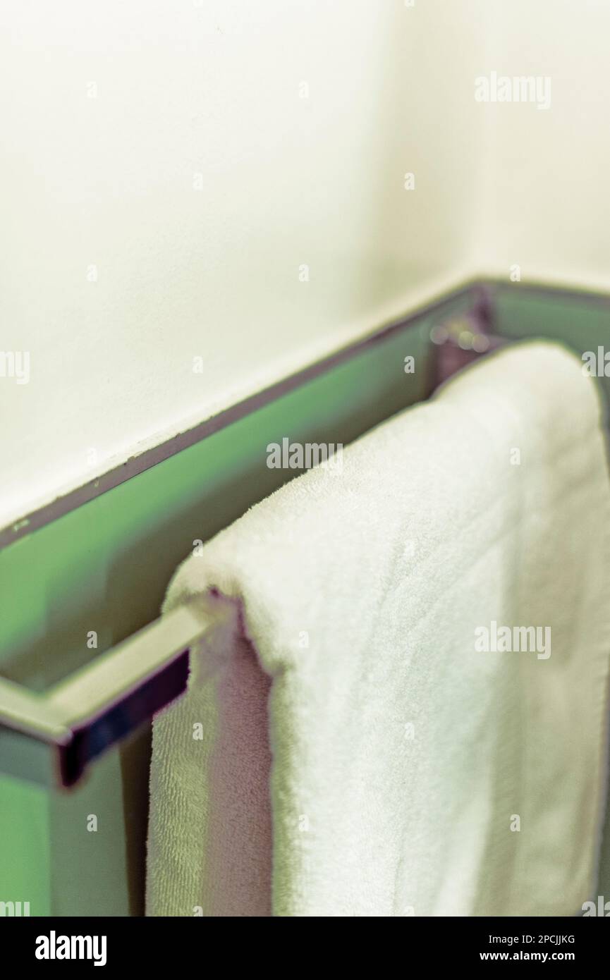 Towel hanging from rack in historic downtown Sitka, Alaska apartment