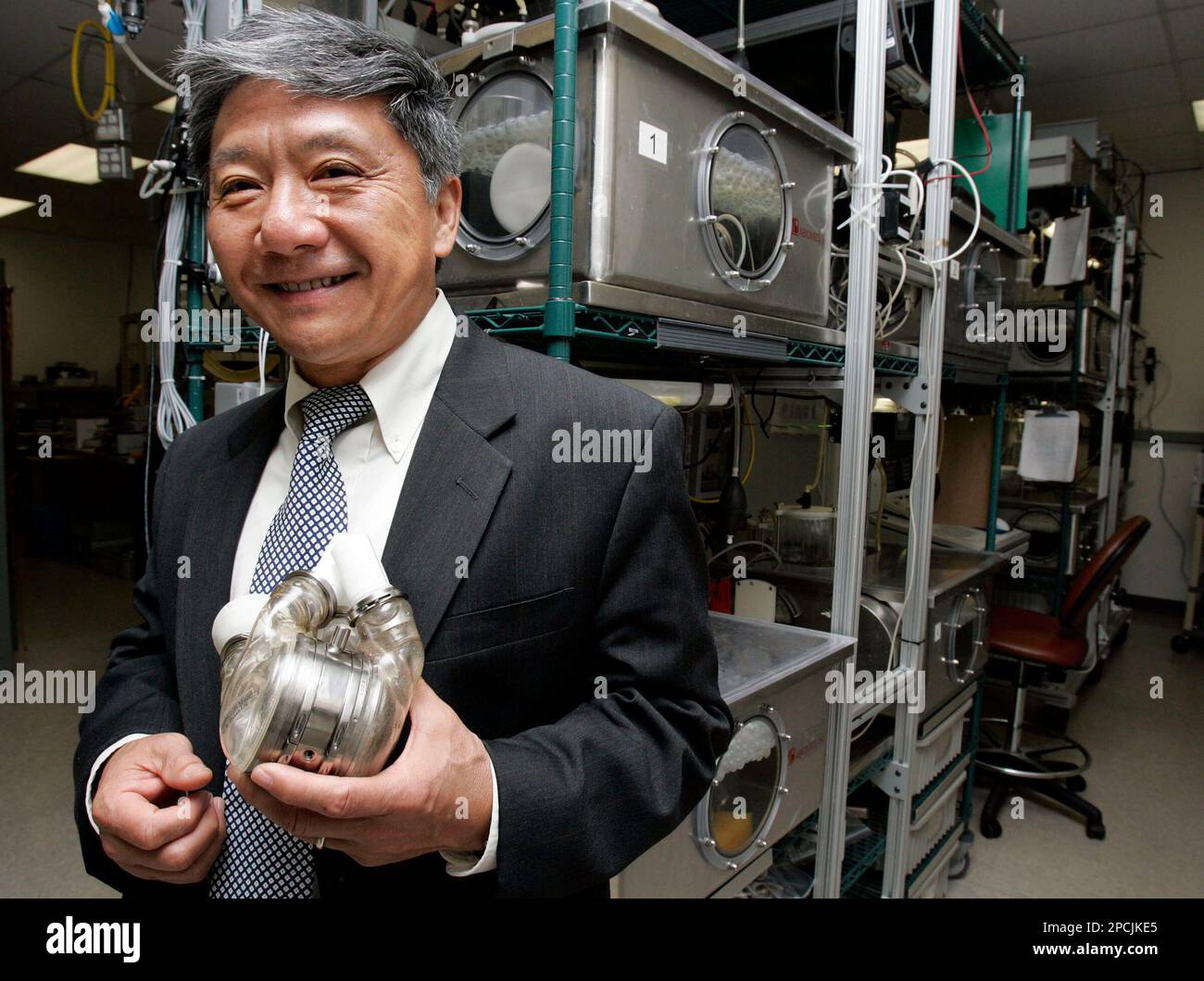 Robert Kung, PhD, Chief Scientific Officer at Abiomed, Inc., poses at  company headquarters with the AbioCor artificial heart Wednesday, Sept. 6,  2006, in Danvers, Mass. The Food and Drug Administration granted Abiomed