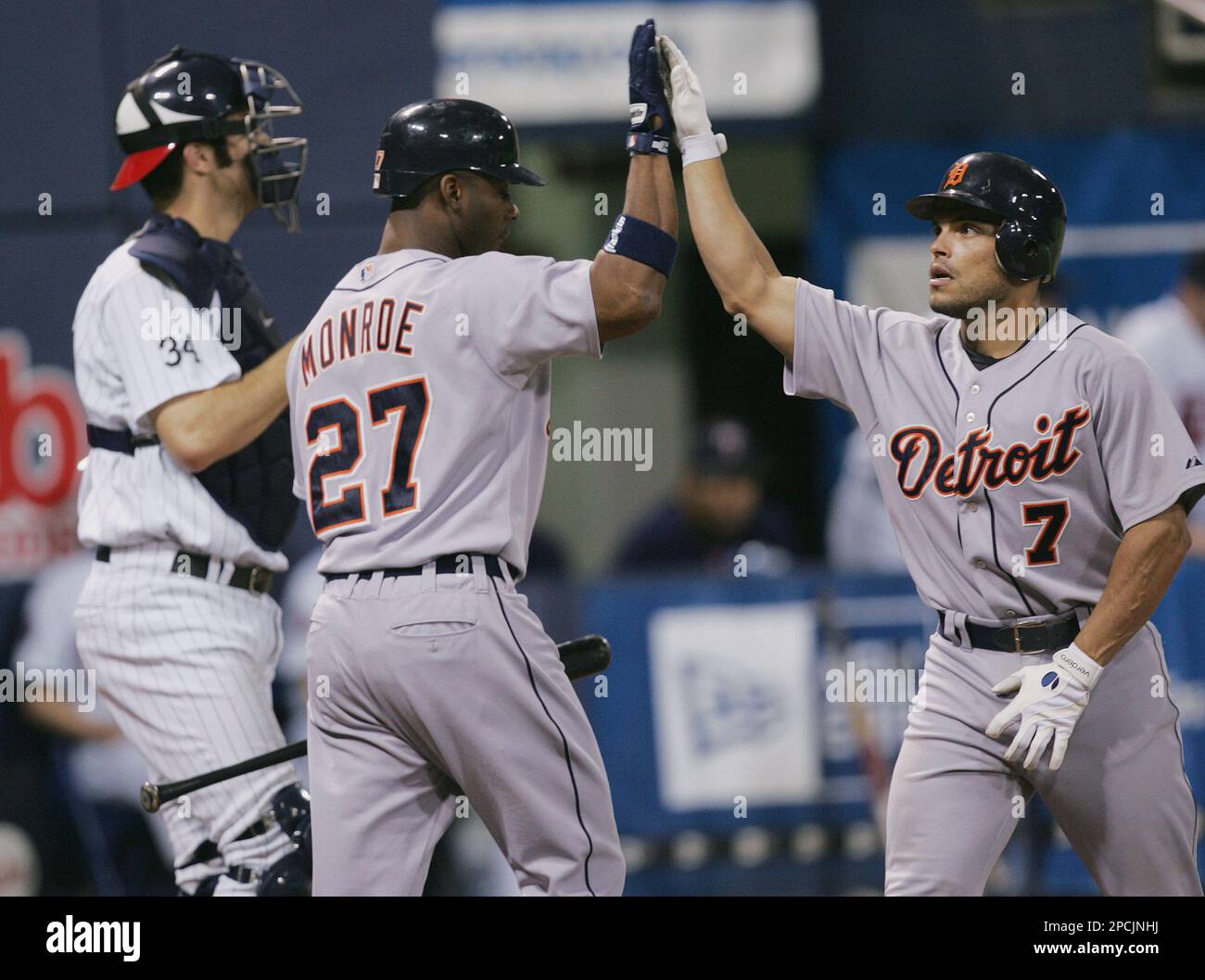 FILE **Detroit Tigers catcher Ivan Rodriguez celebrates scoring