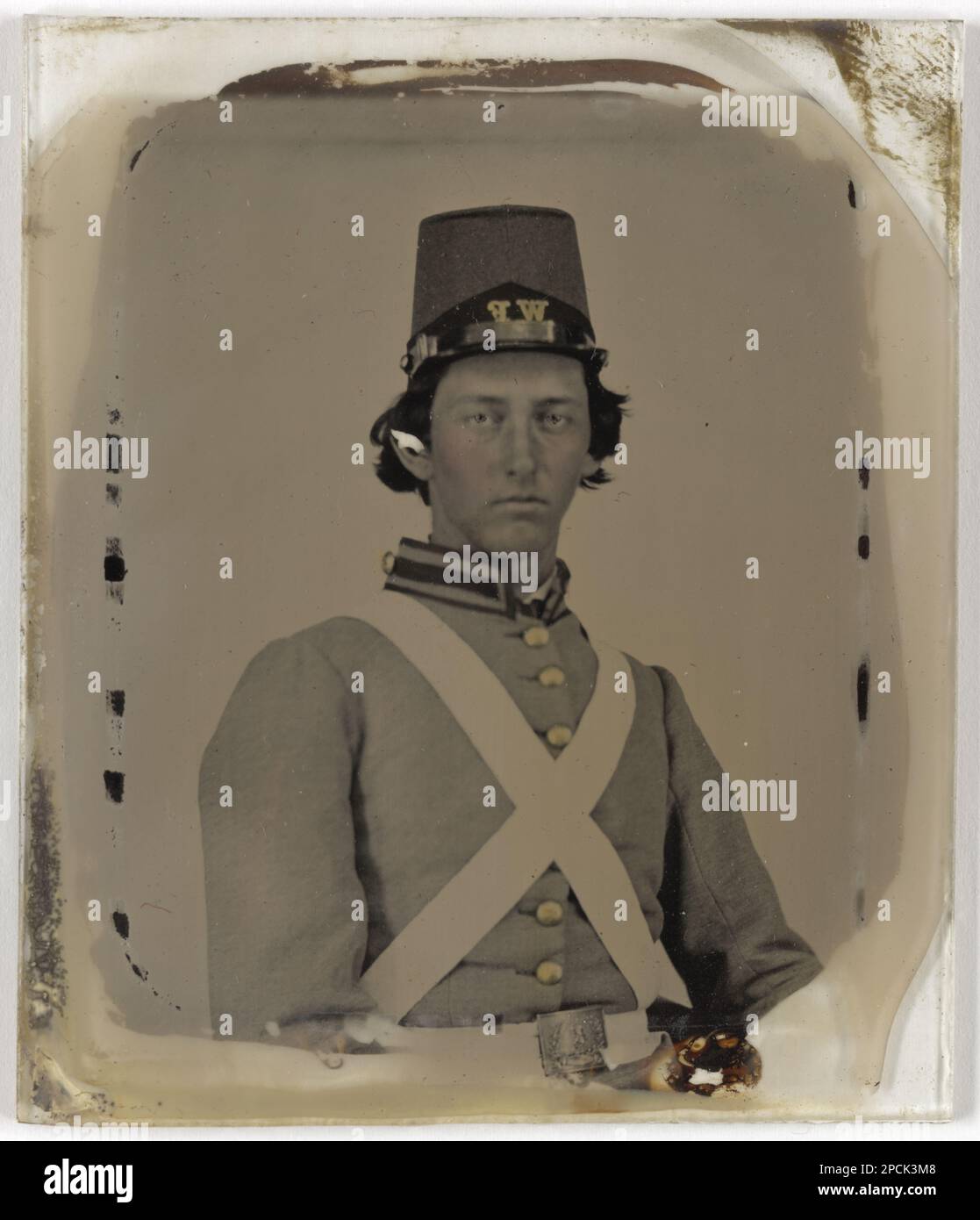 Sergeant Elijah McClanahan Ingles of Co. G, 4th Virginia Infantry Regiment in uniform, cap with 'WF' (Wise Fencibles), and Virginia seal belt buckle. Liljenquist Family Collection of Civil War Photographs , FAmbrotype/Tintype photograph filing series , pp/liljconfed. Ingles, Elijah McClanahan, 1840-1924, Confederate States of America, Army, Virginia Infantry Regiment, 4th, People, 1860-1870, Soldiers, Confederate, 1860-1870, Military uniforms, Confederate, 1860-1870, United States, History, Civil War, 1861-1865, Military personnel, Confederate. Stock Photo
