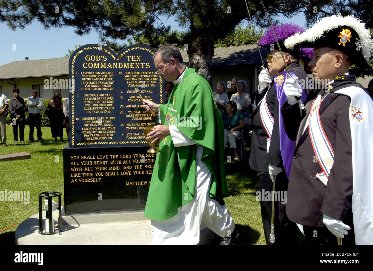 St. Anthony's Catholic Church Pastor Rev. Tom Timmings, left, blesses