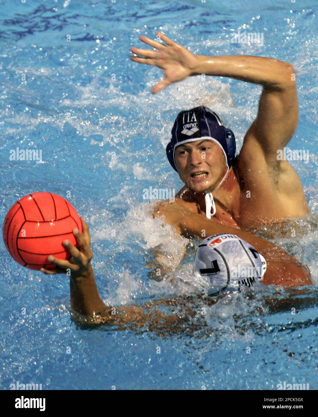 Goran Fiorentini, right, of Italy fights for the ball with Gergely Kiss,  front, of Hungary, during their Group B match, at European Waterpolo  championships, Sunday, Sept. 3, 2006, in Belgrade, Serbia. (AP