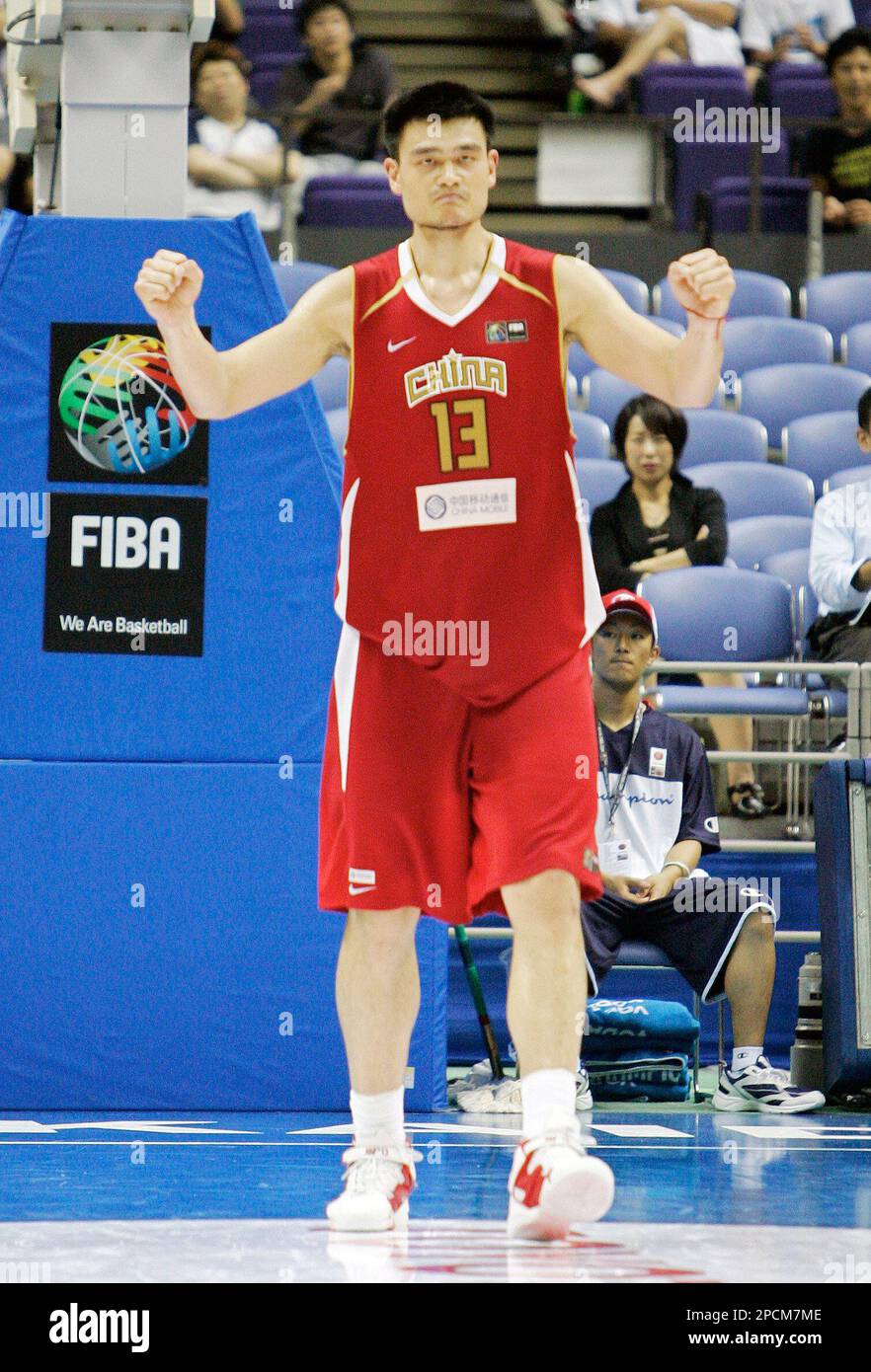 China's Yao Ming celebrates a basket by his team during their