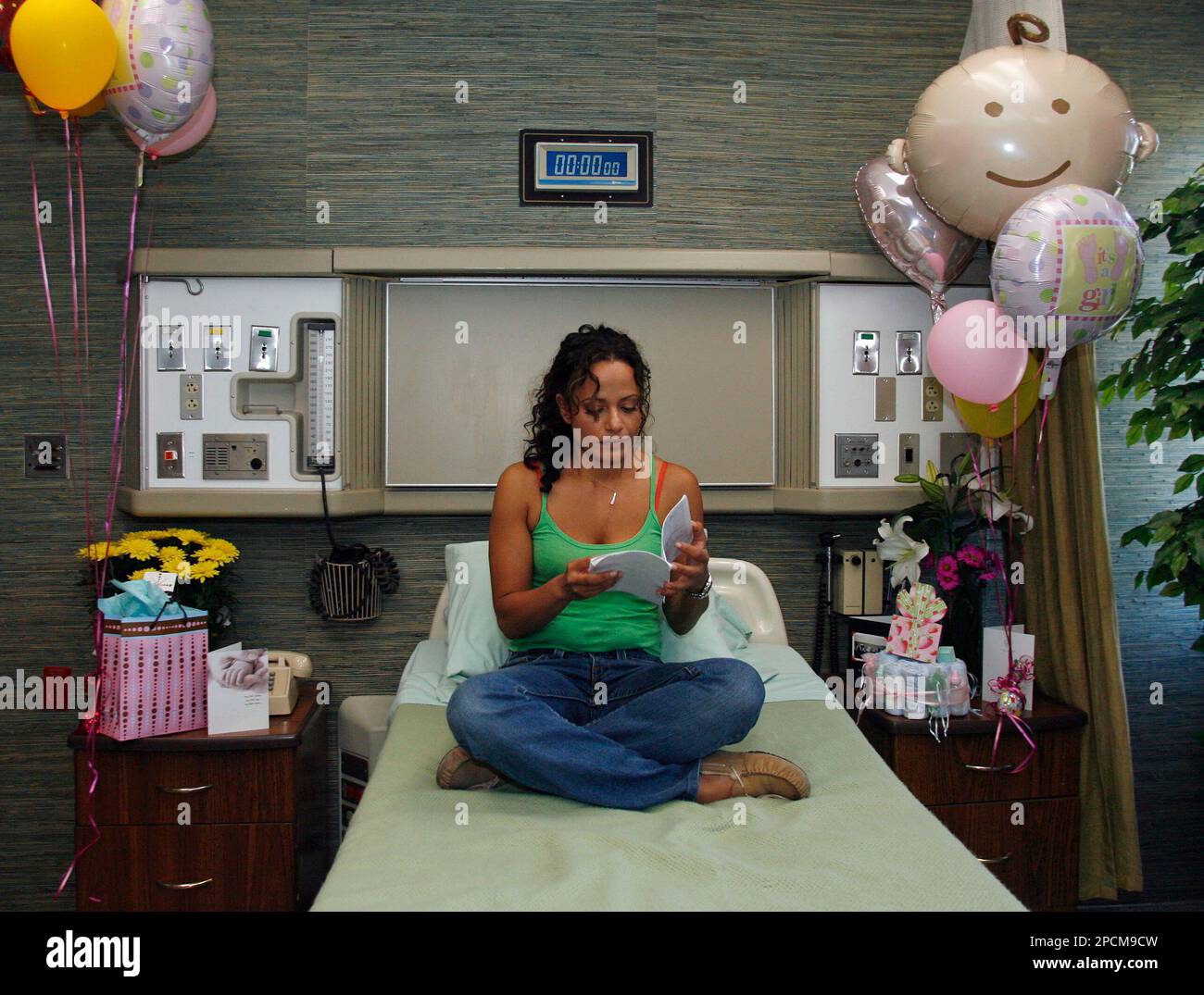 Actress Judy Reyes looks over her script on the set of the television