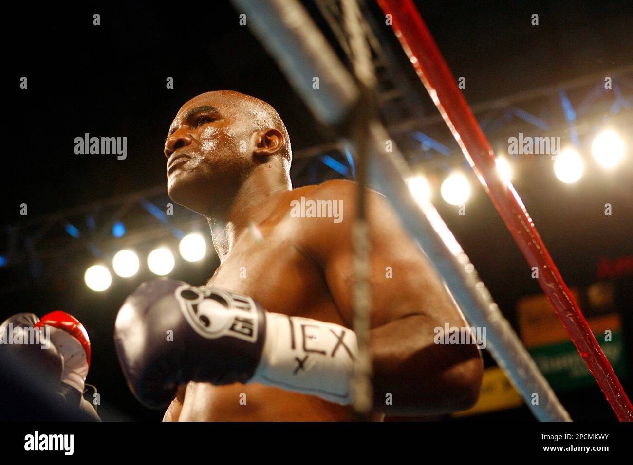 Evander Holyfield waits in the ring before fighting Jeremy Bates in ...