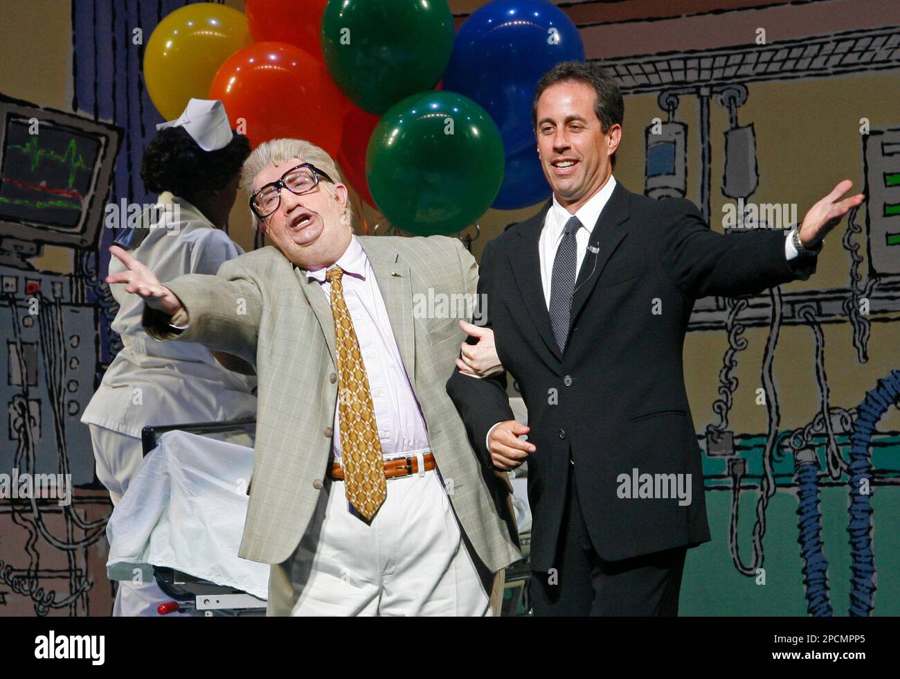 Martin Short, left, reprising the role of his character Jiminy Glick