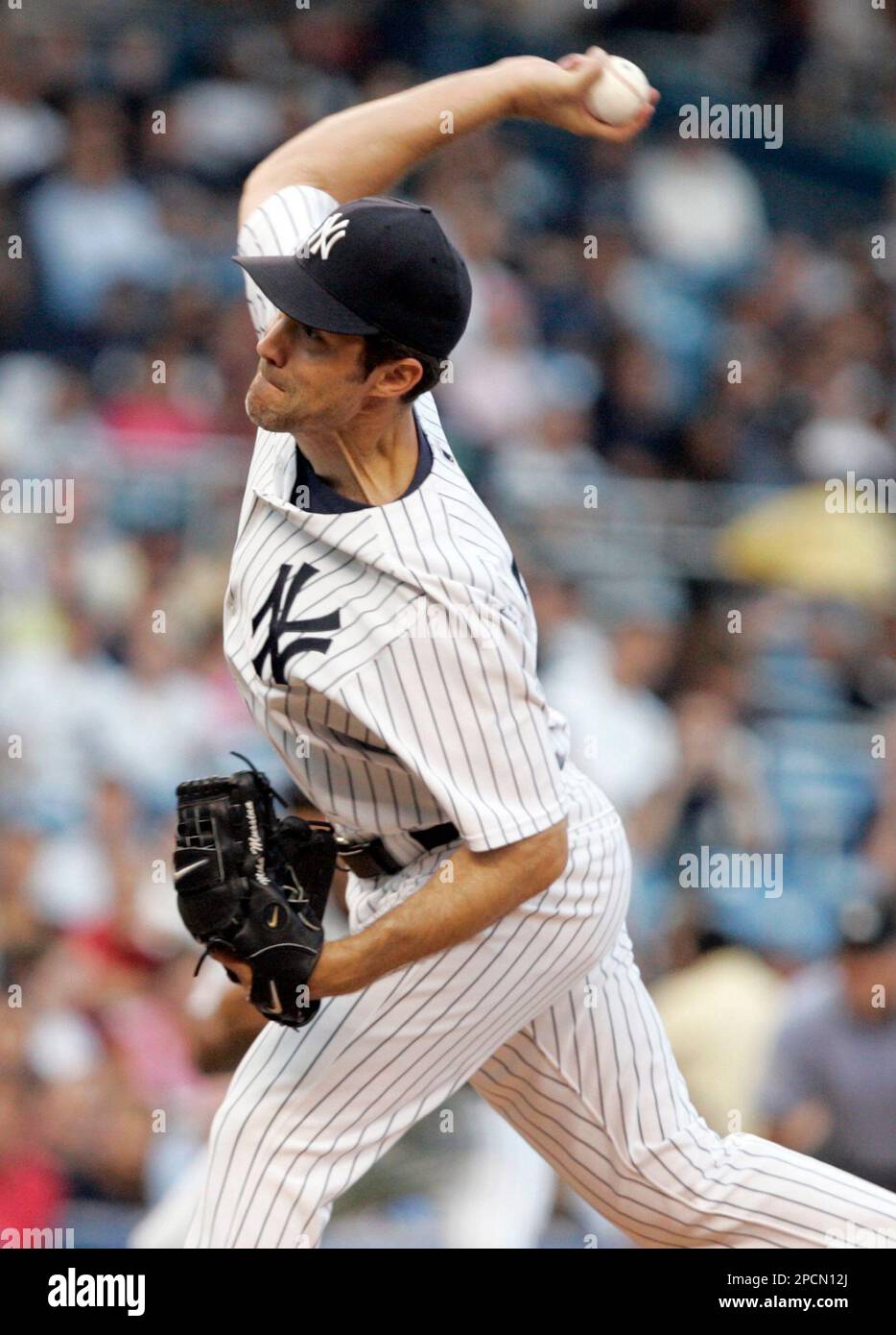New York Yankees pitcher Mike Mussina delivers to the Baltimore