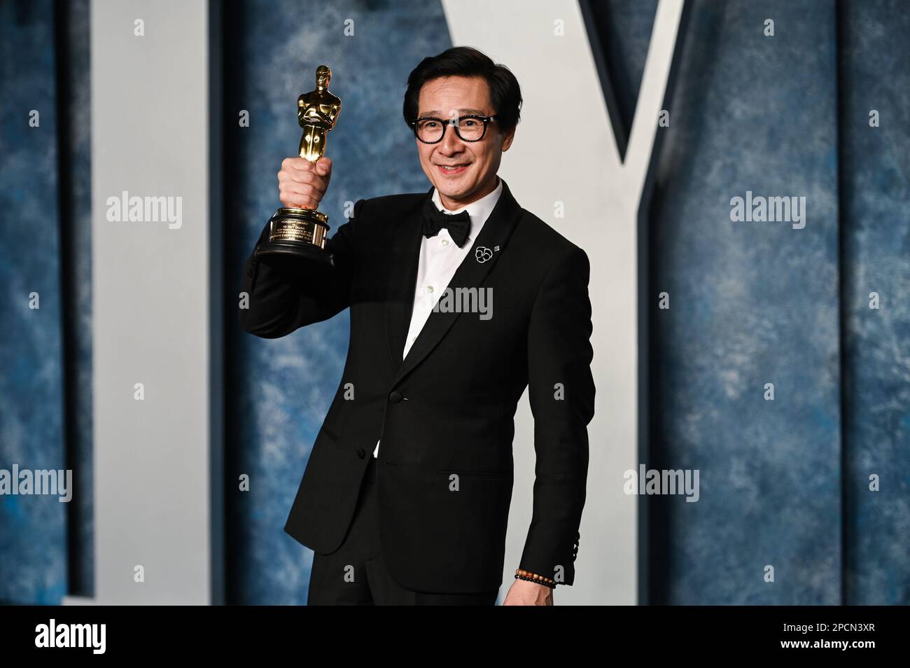 USA. 12th Mar, 2023. Ke Huy Quan walking on the red carpet at the 2023 ...