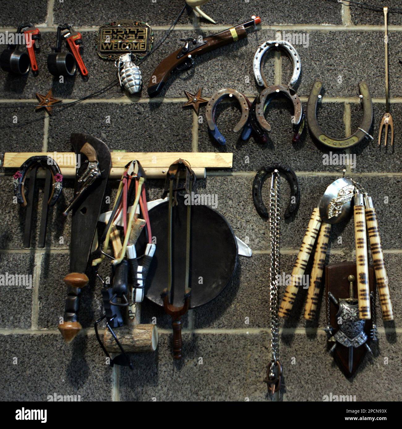 A fake hand grenade, toy gun, and a machete, items travelers have had